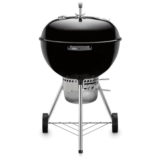 Asador de carbón redondo con tapa, ideal para parrilla y ahumados en exteriores.