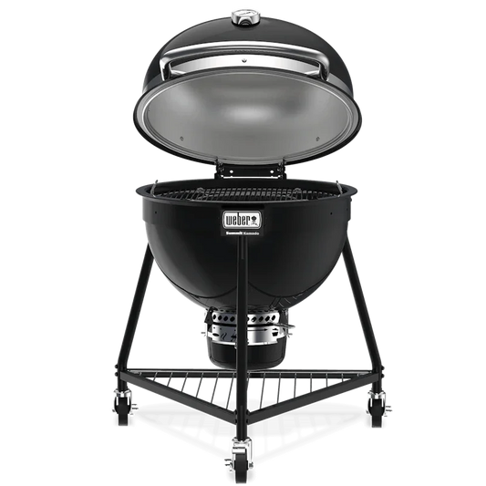 Asador Weber Summit Kamado de carbón, tapa abierta, ideal para parrilla y ahumados.