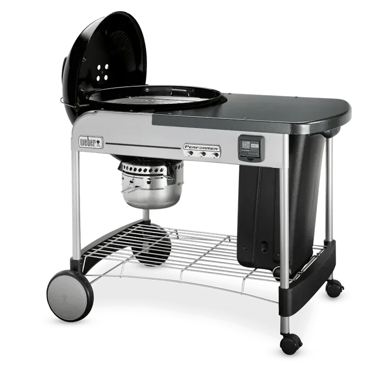 Asador de carbón tipo parrilla negra, ideal para BBQ, asados y ahumados en exteriores